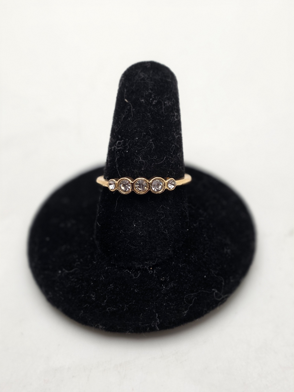 Gold Bezel Five-Stone Ring - Elegant Clear Stones
